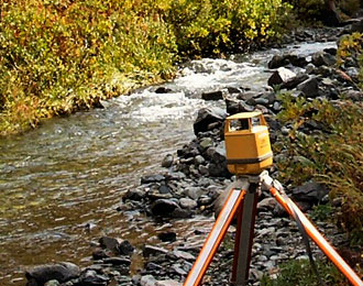 Survey Tripod on River