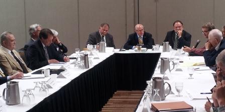 Image of summit members around table during Summit