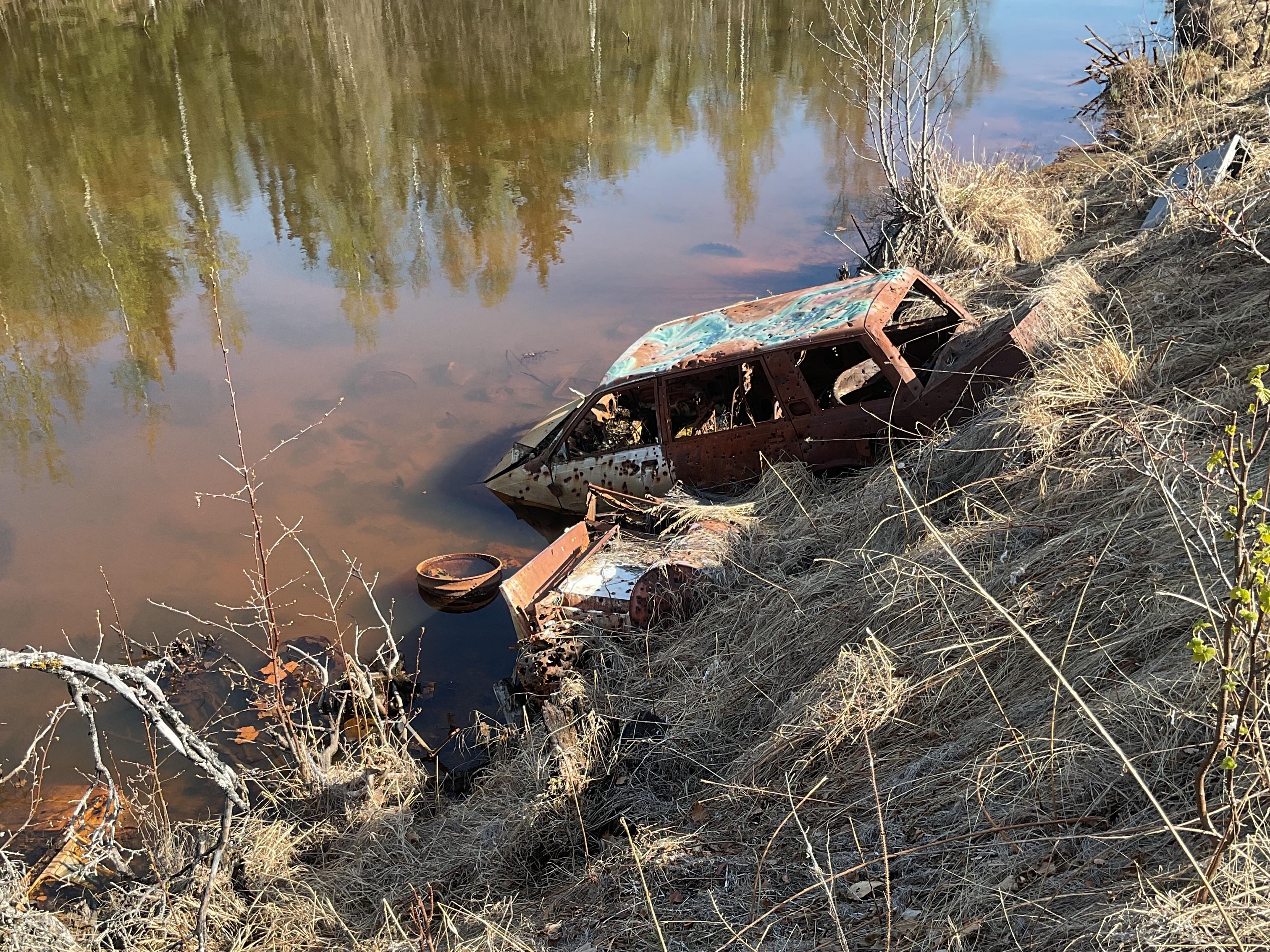 Decorative Header Image 1 - a dumped car in Goose Bay