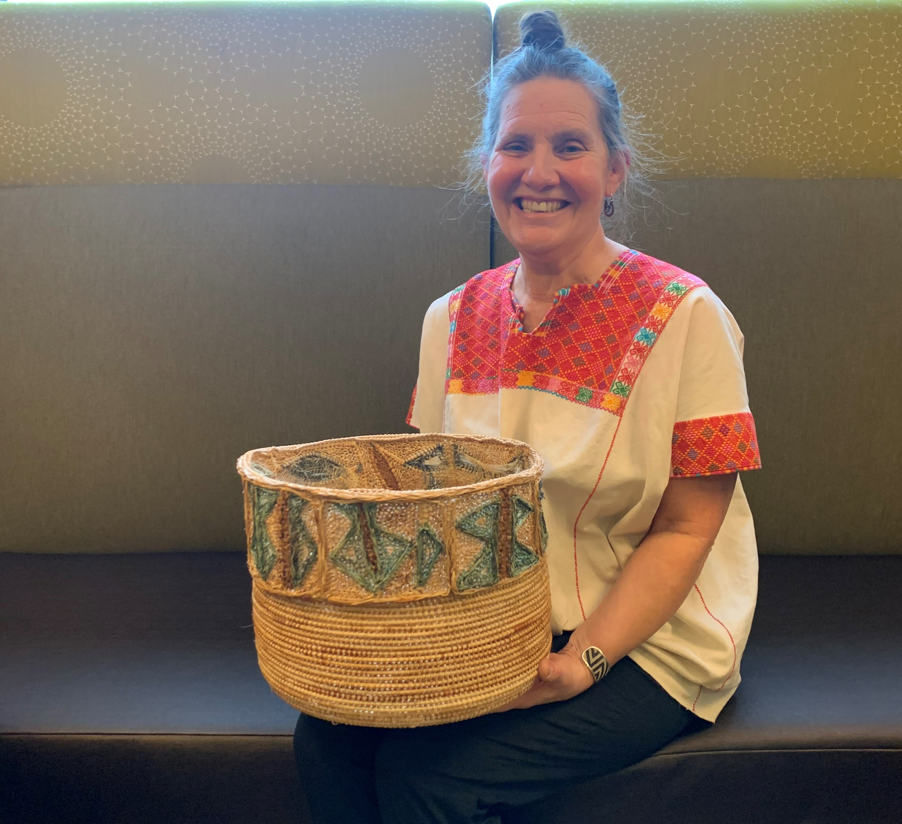 Kathy Rousso with handmade basket