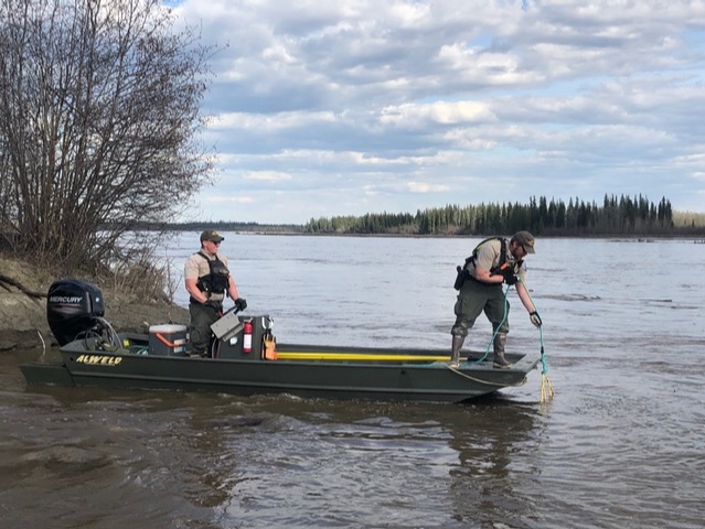 Rangers in boat searching