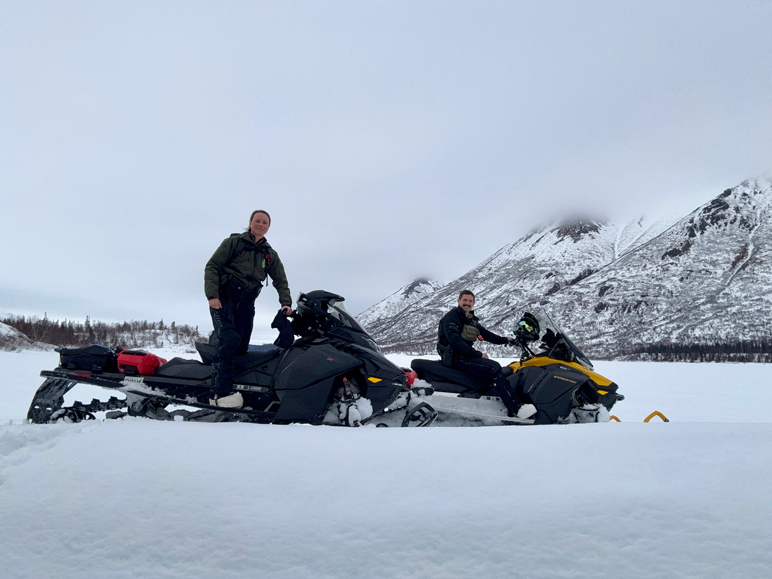 Parks Staff on Snow Machines in wintertime