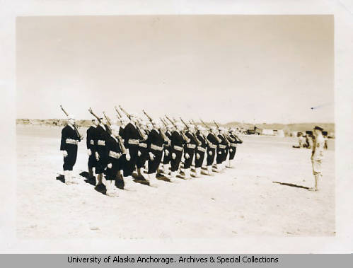 Photograph of a marching drill done by soldiers on Kodiak Naval Operating Base, circa 1943. Courtesy of George Gelbish photographs, Archives and Special Collections, Consortium Library, University of Alaska Anchorage.