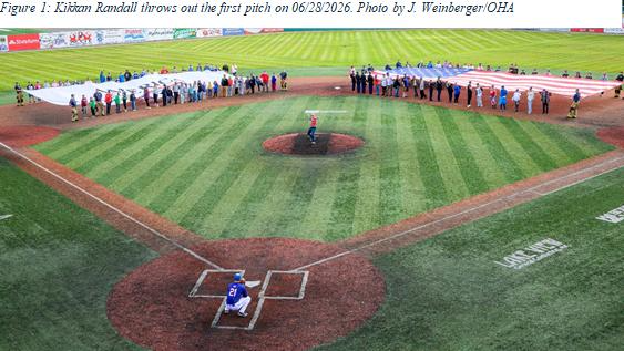 Kikkan Randall throws out the first pitch on June 28, 2026. Photo by J. Weinberger, Office of History and Archaeology