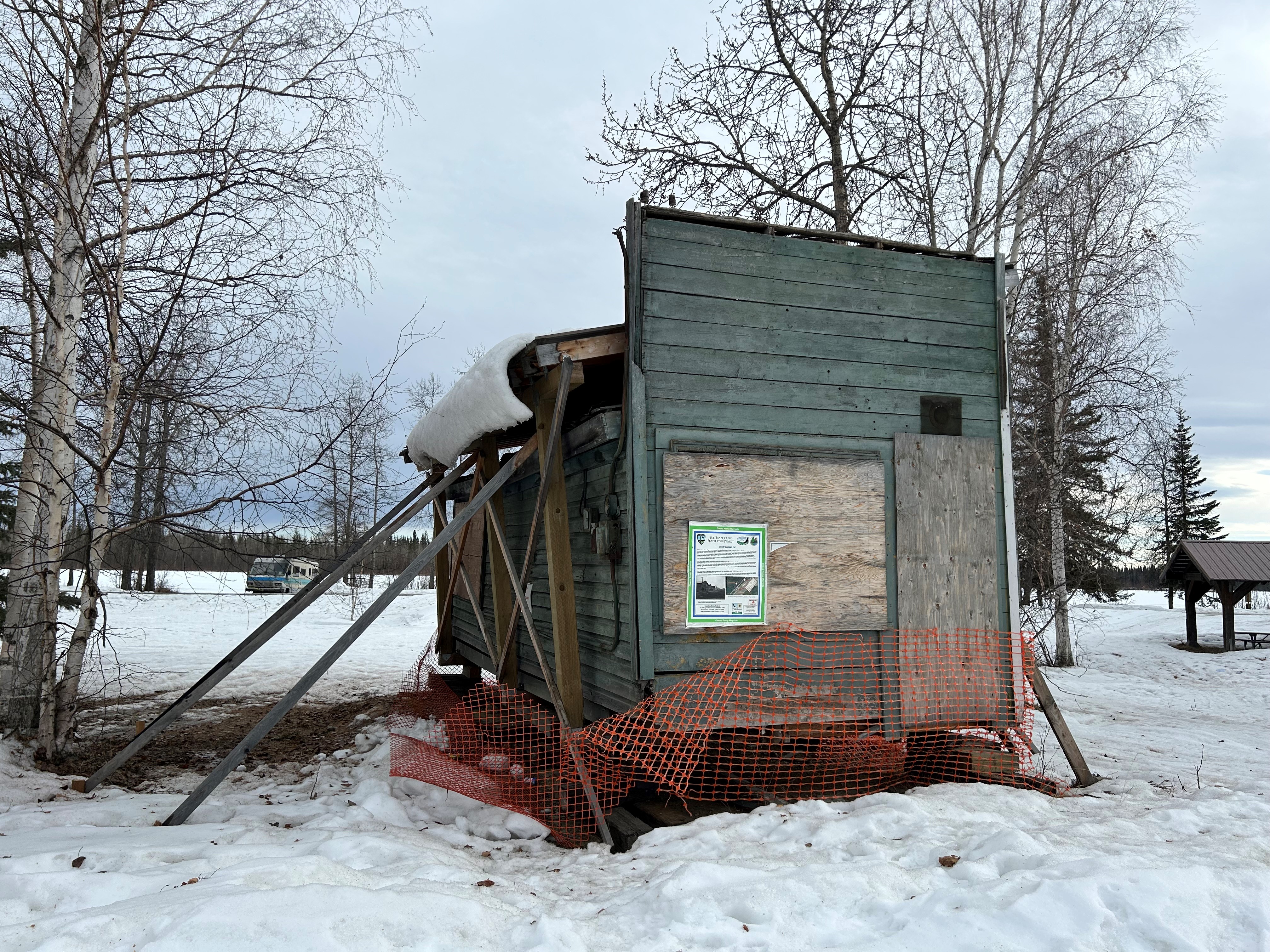 The northwest elevation of the Chena Building, April 2024. Returned to Alaska State Parks Chena Pump Wayside, the site of the now vanished historic Chena Townsite, the Chena Building, a remarkable survivor, stands as a testament to the commercial properties of interior Alaska during the gold rush era. Its resilience is evident in its journey from the establishment of Chena in 1905 to the town's fall, a period marked by its interpretive value and the significance of its rediscovery and return to the original historic townsite after more than 100 years. This unique journey supports the Chena Building's nomination under Criteria A, making it a truly exceptional piece of history.