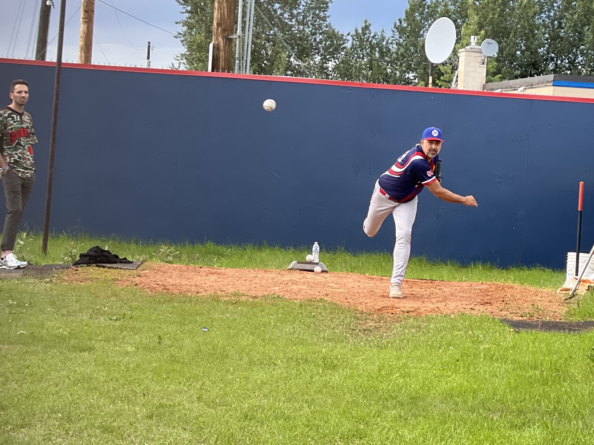 Baseball plater throwing ball